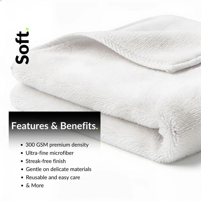 White microfiber cloth included in a sneaker cleaning kit used for wiping and polishing shoes during cleaning