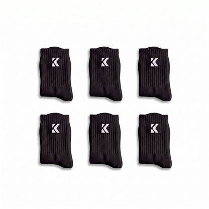 Black crew socks 6 pack with cushioned soles, arch support and breathable knit.