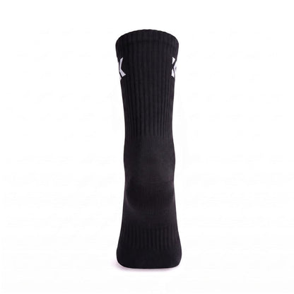 Rear view of a black crew sock showing the ribbed crew leg and jacquard knit logo.