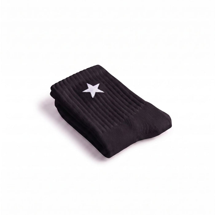 Folded Black Crew Sock with a white star design, ideal for everyday wear and athletic comfort.