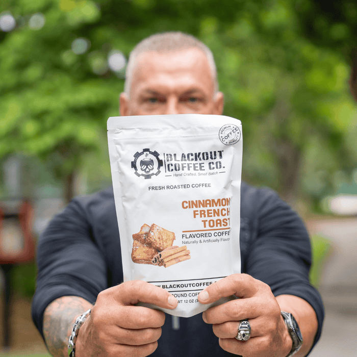 cinnamon french toast man holding the coffee bag