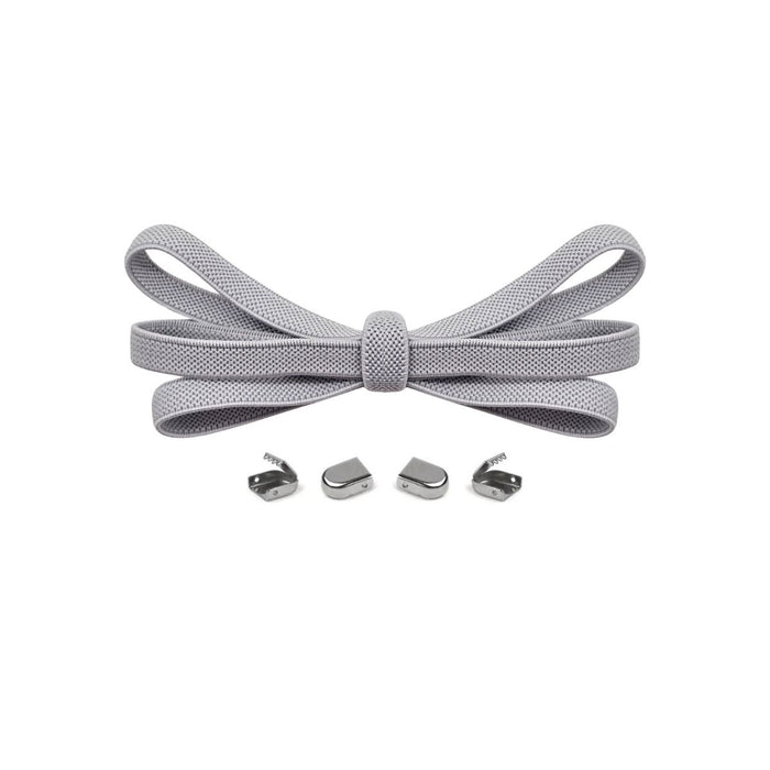 Light grey no-tie elastic shoelaces with buckle lock system for converting sneakers into slip-on shoes by Kicks Shoelaces.