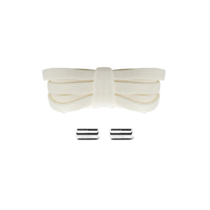 Light beige elastic no-tie shoelaces with silver capsule lock system for a premium all-black sneaker finish, easy slip-on fit.