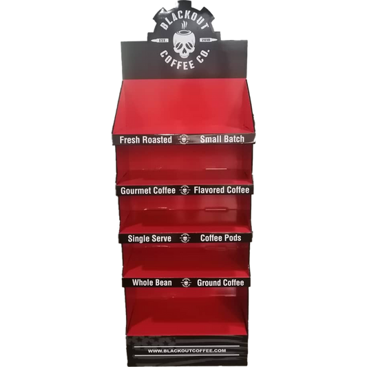Red display rack with Blackout Coffee Co branding on a white background