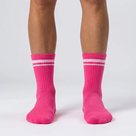 Hot pink athletic crew socks with secure supportive fit by Kicks Shoelaces