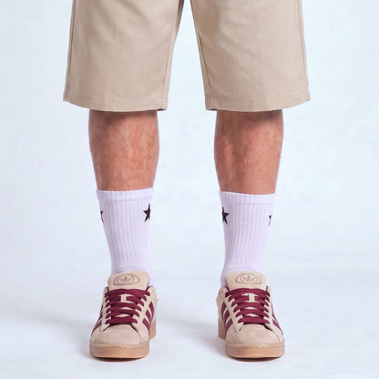 Model wearing Stone Khaki and Maroon Adidas Campus 00s with maroon 15mm wide replacement laces in a clean studio setting by Kicks Shoelaces