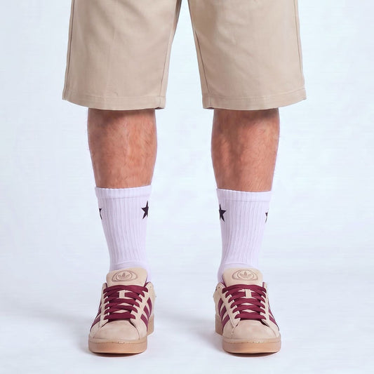 Model wearing Stone Khaki and Maroon Adidas Campus 00s with maroon 15mm wide replacement laces in a clean studio setting by Kicks Shoelaces