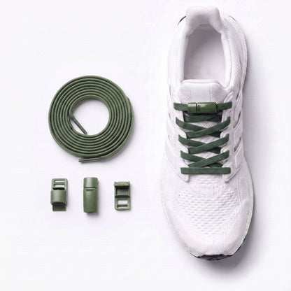 White sneaker fitted with magnetic no-tie shoelaces and a magnetic lock system.