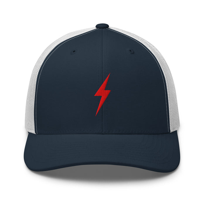 White and navy trucker hat with an embroidered red lightning bolt design on the front panel