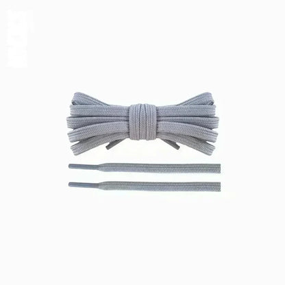 Light grey replacement laces for Nike Free Run 5 sneakers by Kicks Shoelaces.
