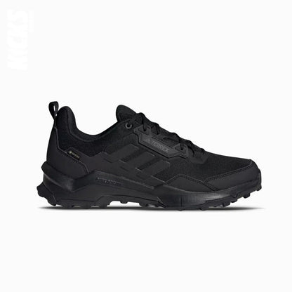A pair of black Adidas GORE-TEX hiking shoes with replacement laces.
