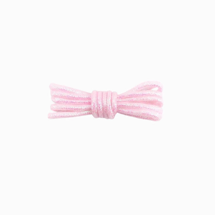 A pair of round, light pink glitter shoelaces tied in a knot on a white background.