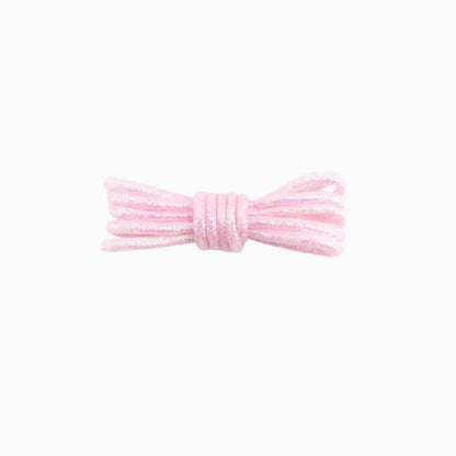 A pair of round, light pink glitter shoelaces tied in a knot on a white background.