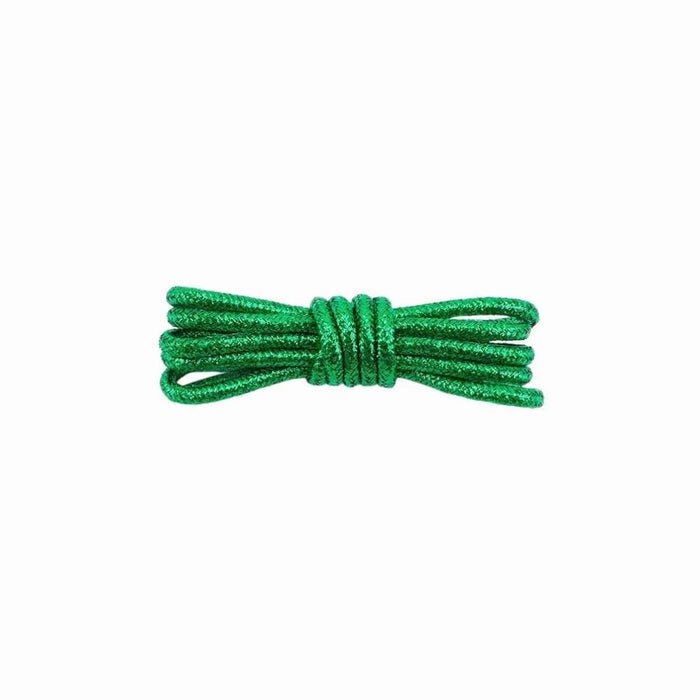 A pair of round, green glitter shoelaces tied in a knot on a white background.