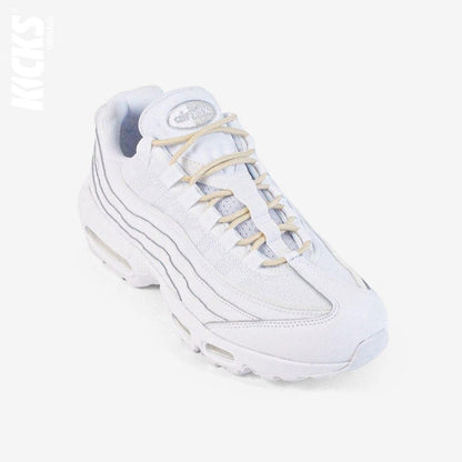 Beige round shoestrings on white sneakers by Kicks Shoelaces