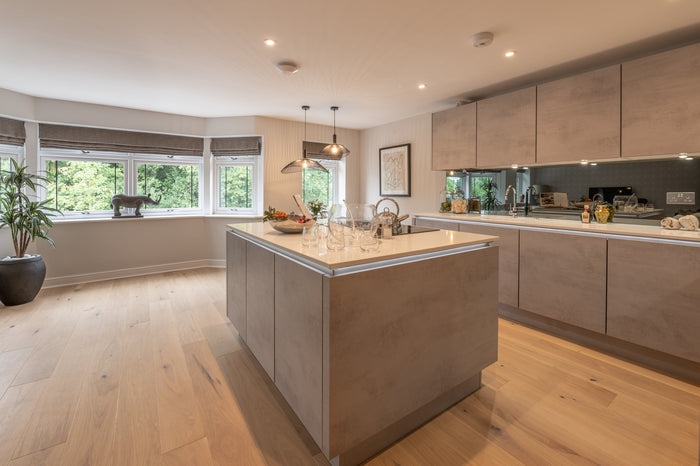 Modern kitchen with Driftwood Jetsum Oak wood floors installed