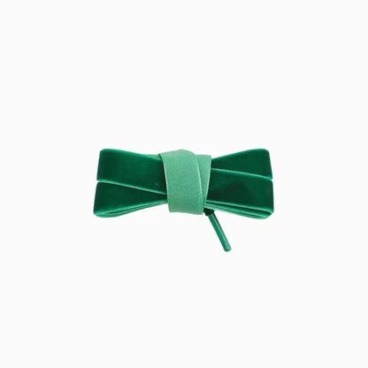 Green velvet fat laces for Adidas, Vans, and Converse sneakers by Kicks Shoelaces.
