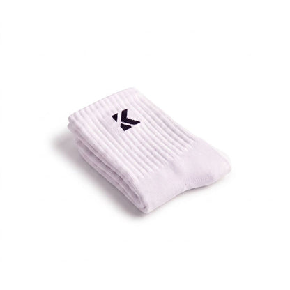Folded white crew sock with a soft jacquard knit logo and premium construction.